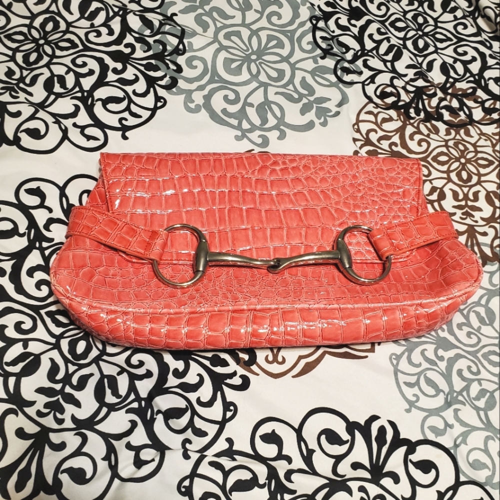 Pink alligator embossed patent leather horsebit purse